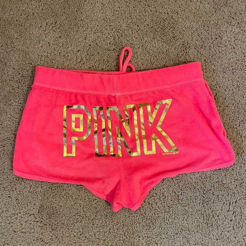 Medium neon pink terry cloth PINK shorts.